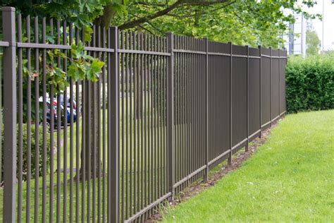 Enhancing Curb Appeal With A Rod Iron Fence